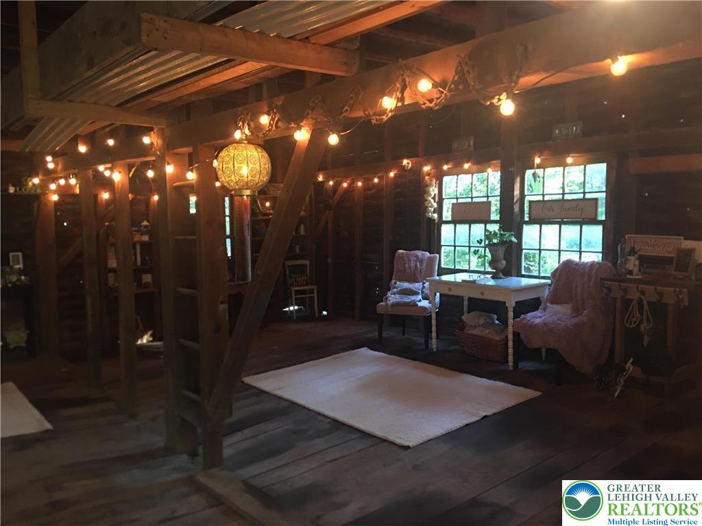 2058 River Road Mount Bethel, PA 18343 - Photo 33 of 39 a living room with furniture and a large window