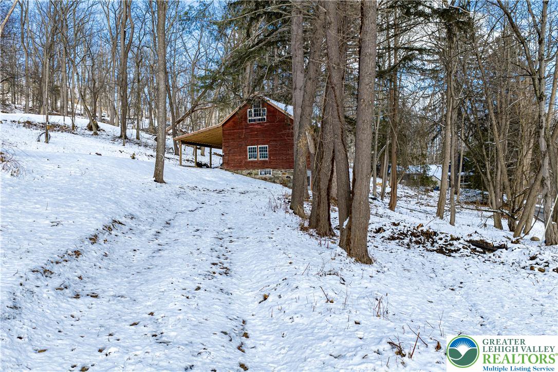 2058 River Road Mount Bethel, PA 18343 - Photo 9 of 39 a street view covered with snow