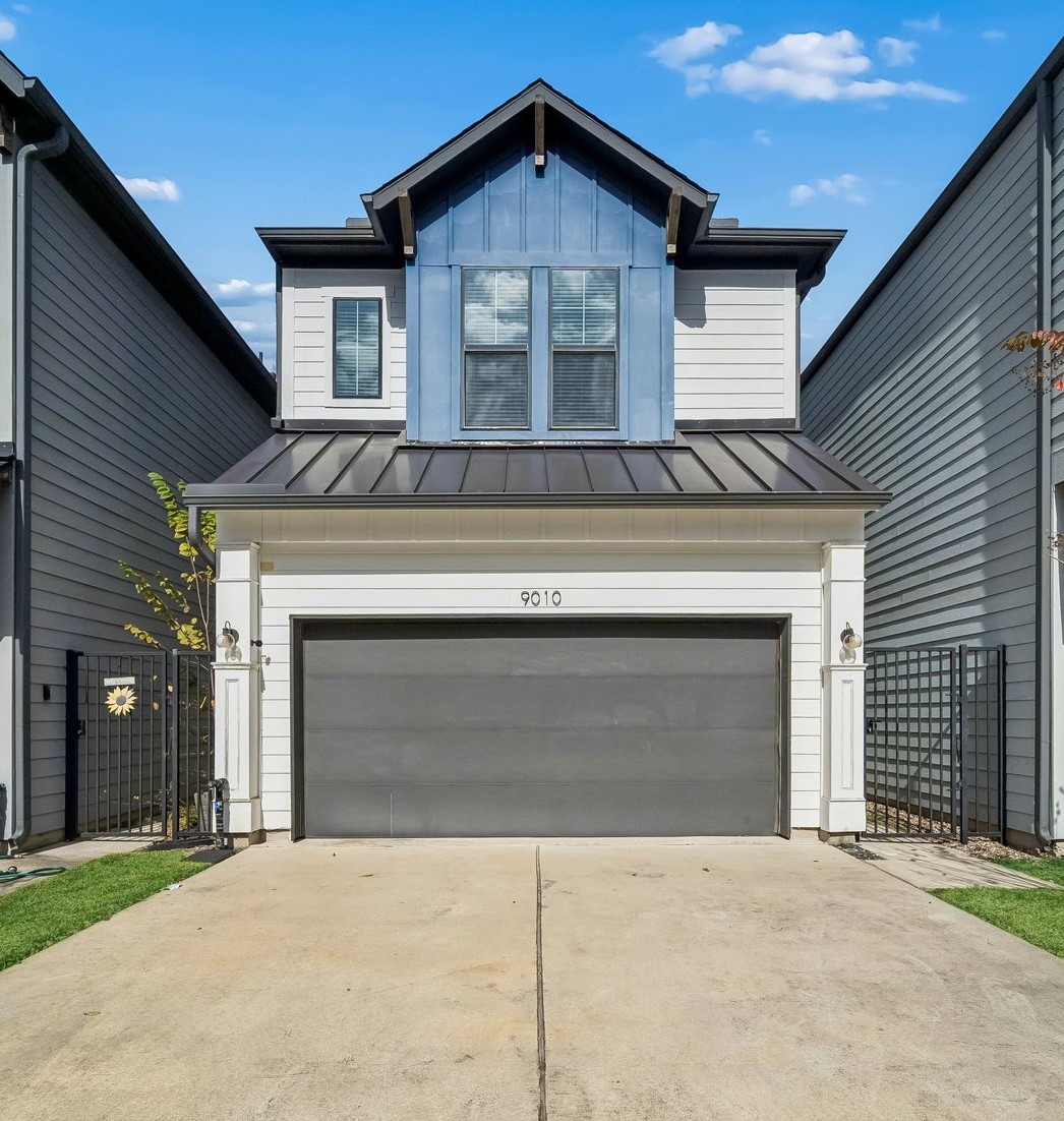 a front view of a house with yard