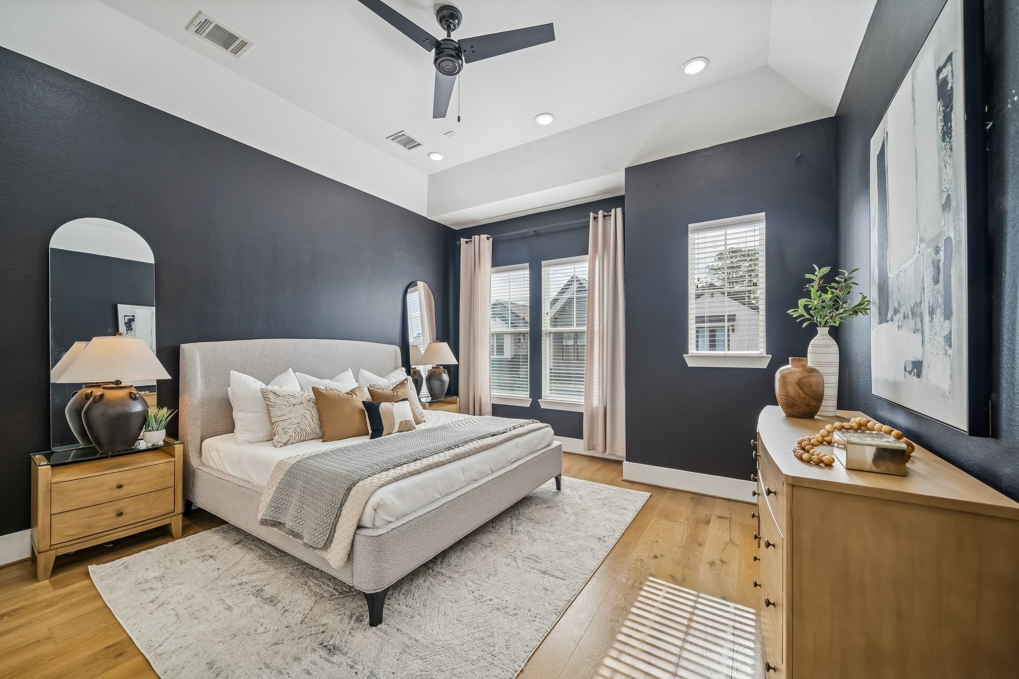 9010 Wellspring Drive Houston, TX 77080 - Photo 11 of 19 a bedroom with a bed and wooden floor