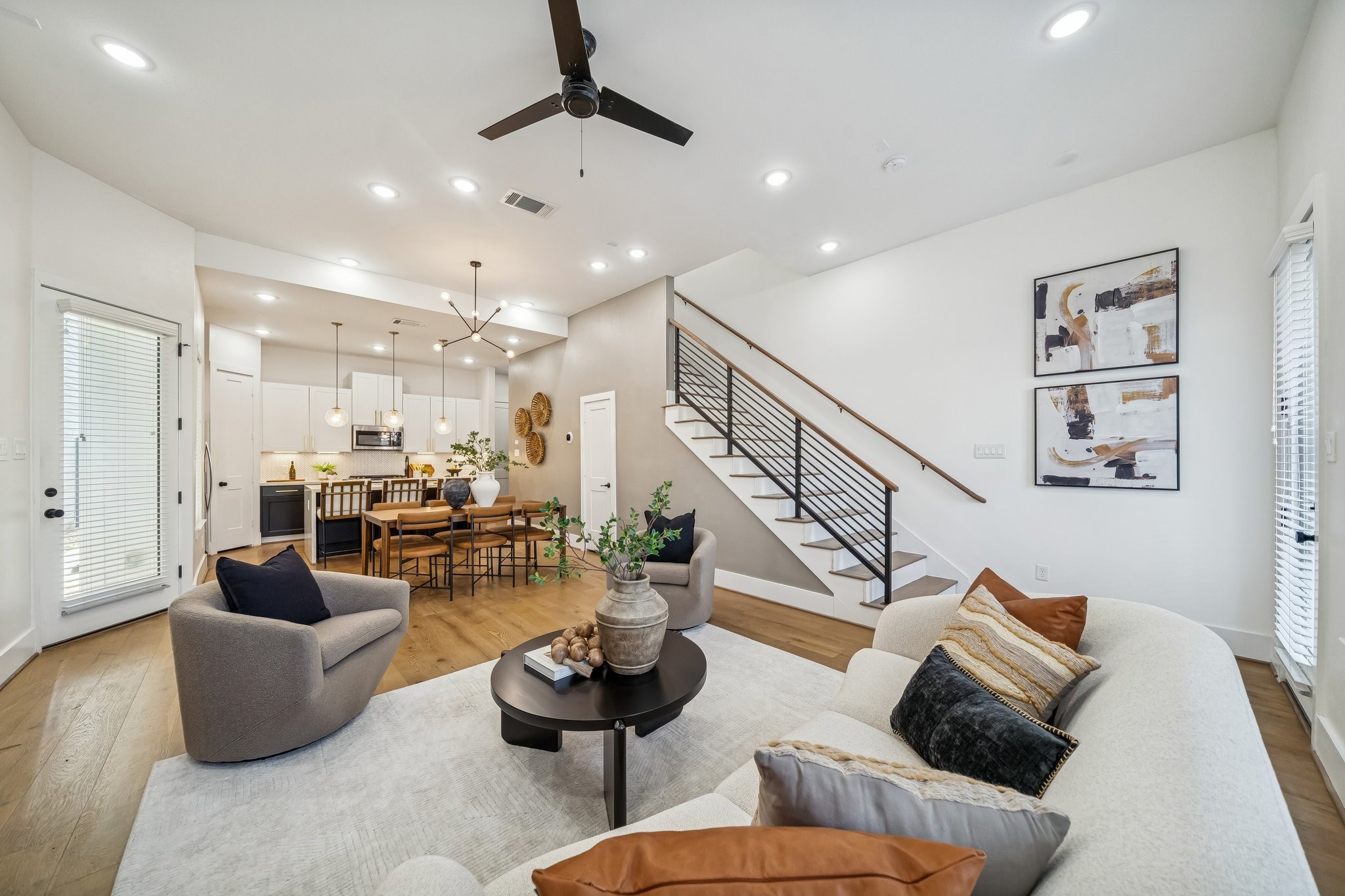 9010 Wellspring Drive Houston, TX 77080 - Photo 3 of 19 a living room with furniture kitchen view and a chandelier