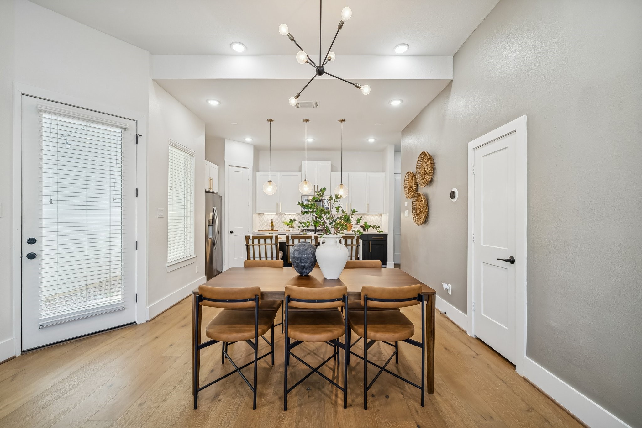 9010 Wellspring Drive Houston, TX 77080 - Photo 9 of 19 a dining room with furniture and wooden floor