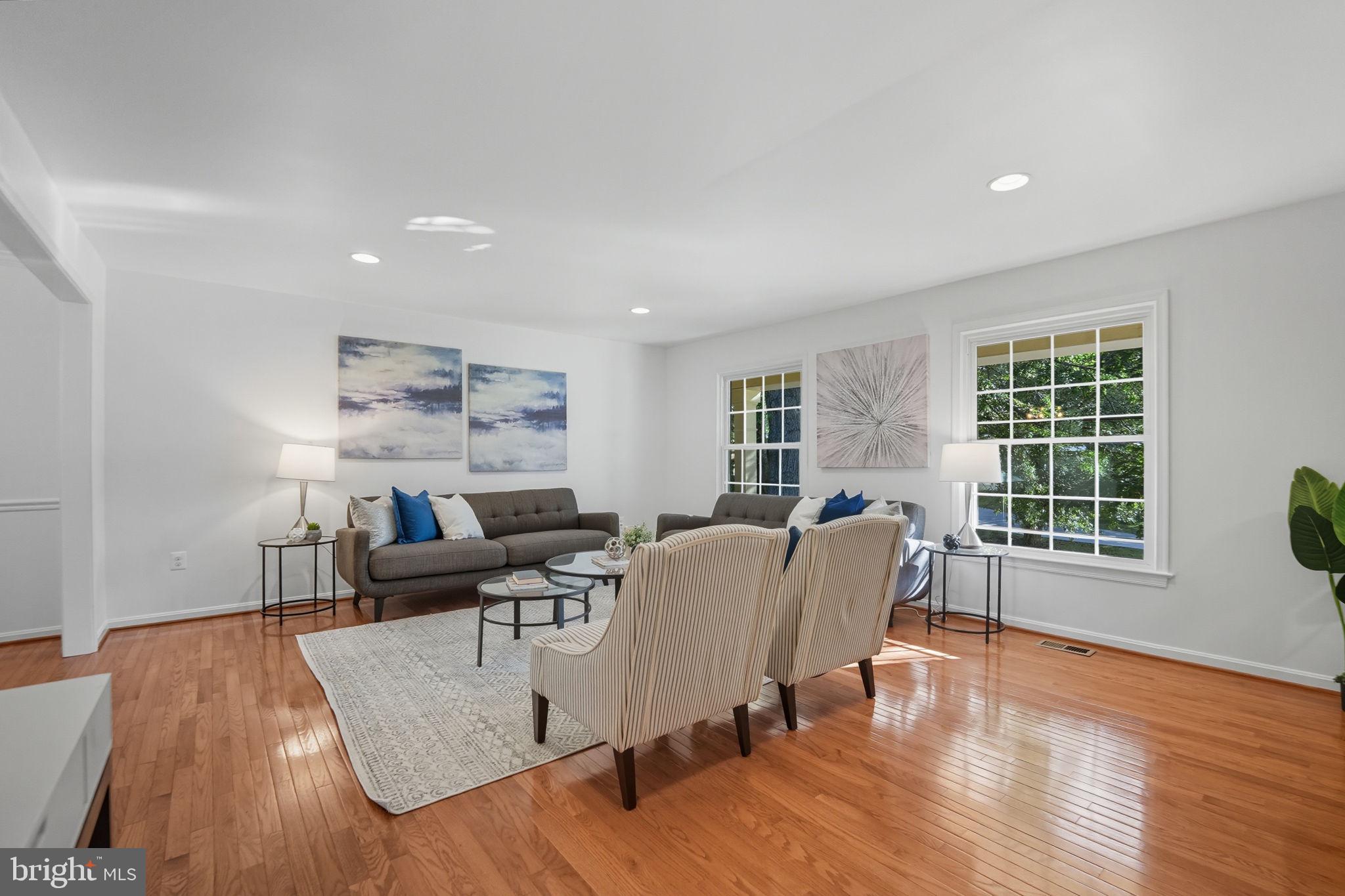 10196 Red Spruce Road Fairfax, VA 22032 - Photo 5 of 36 a living room with furniture and a wooden floor