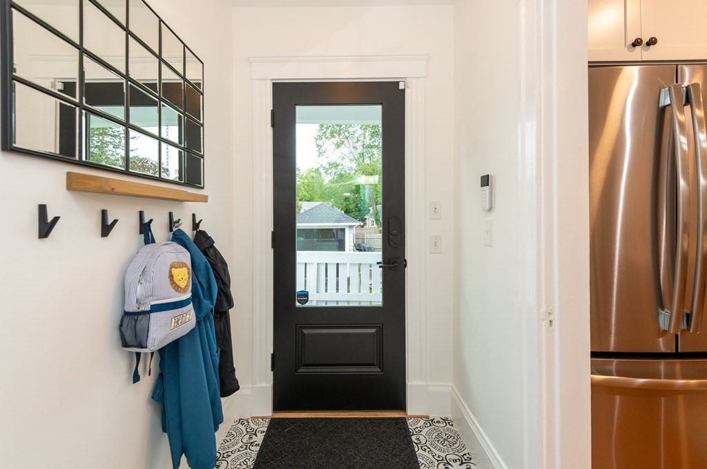 23 Trask Street Danvers, MA 01923 - Photo 11 of 42 a view of walk in closet with wooden floor