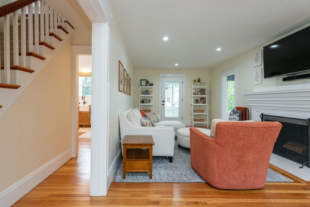 23 Trask Street Danvers, MA 01923 - Photo 15 of 42 a living room with furniture wooden floor and a flat screen tv