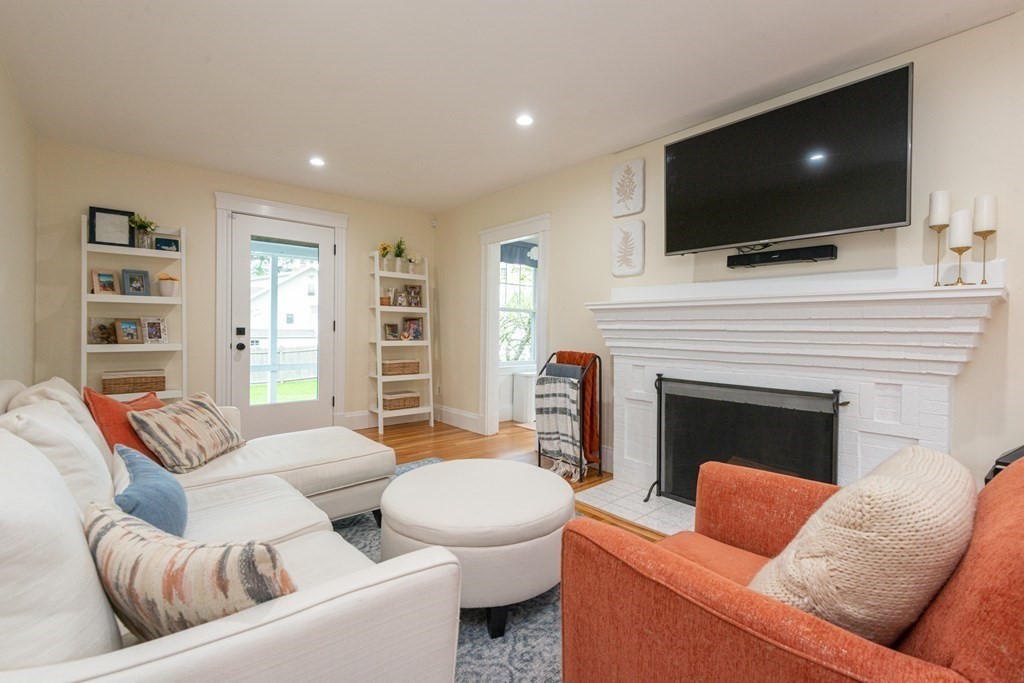 23 Trask Street Danvers, MA 01923 - Photo 18 of 42 a living room with furniture and a flat screen tv
