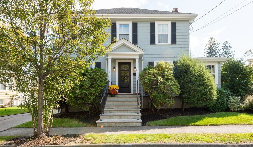 23 Trask Street Danvers, MA 01923 - Photo 2 of 42 a front view of a house with garden