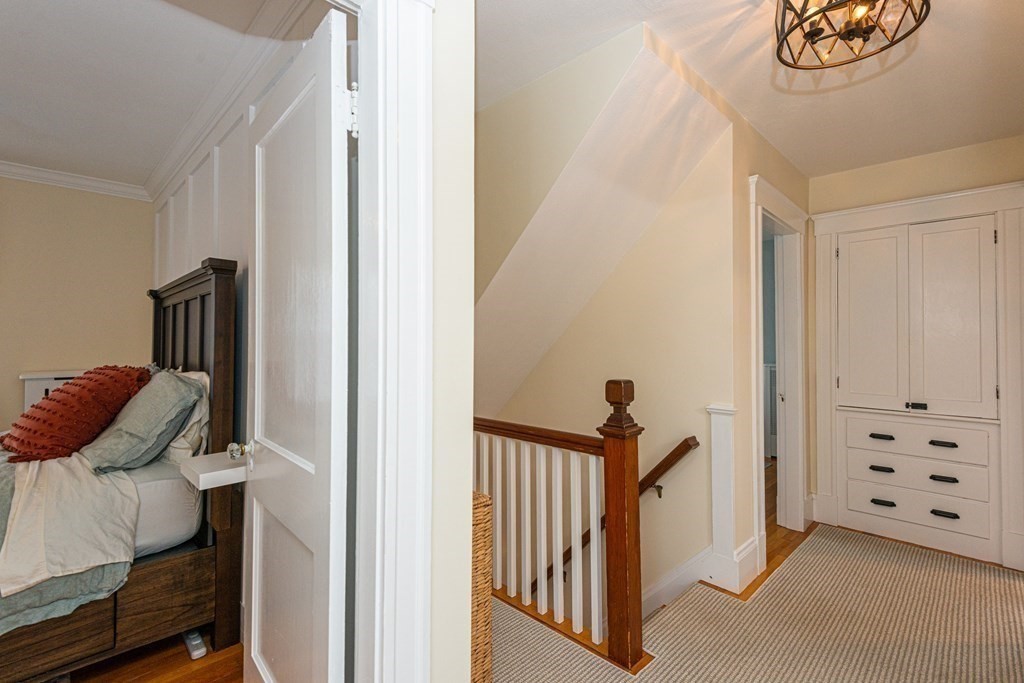 23 Trask Street Danvers, MA 01923 - Photo 24 of 42 a view of a hallway with closet and stairs
