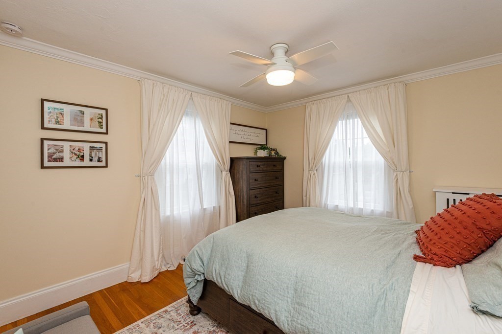 23 Trask Street Danvers, MA 01923 - Photo 25 of 42 a bedroom with a bed and a window