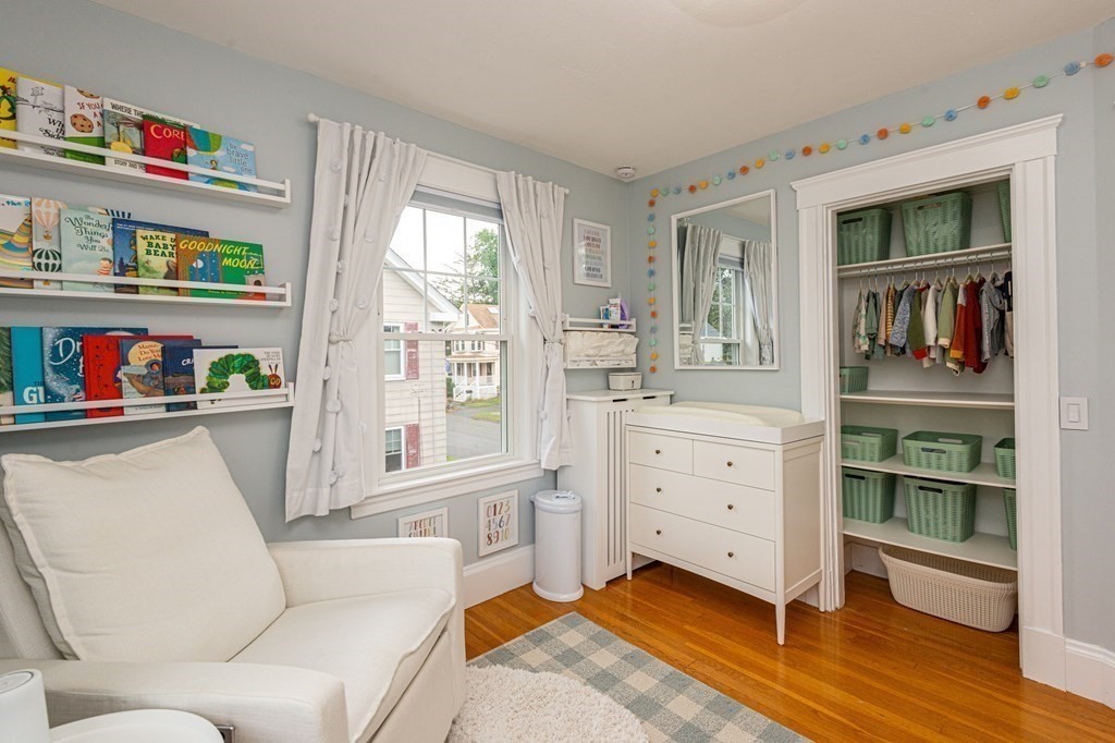 23 Trask Street Danvers, MA 01923 - Photo 28 of 42 a living room with furniture cabinets and a window