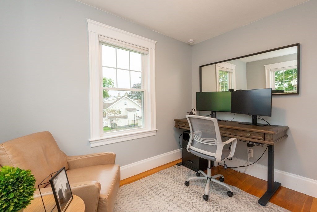 23 Trask Street Danvers, MA 01923 - Photo 32 of 42 a view of a workspace with furniture and a window