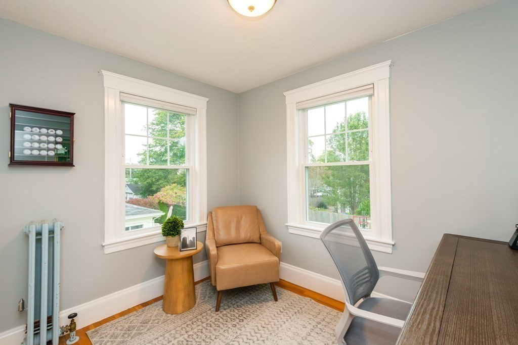 23 Trask Street Danvers, MA 01923 - Photo 33 of 42 a living room with furniture and a window