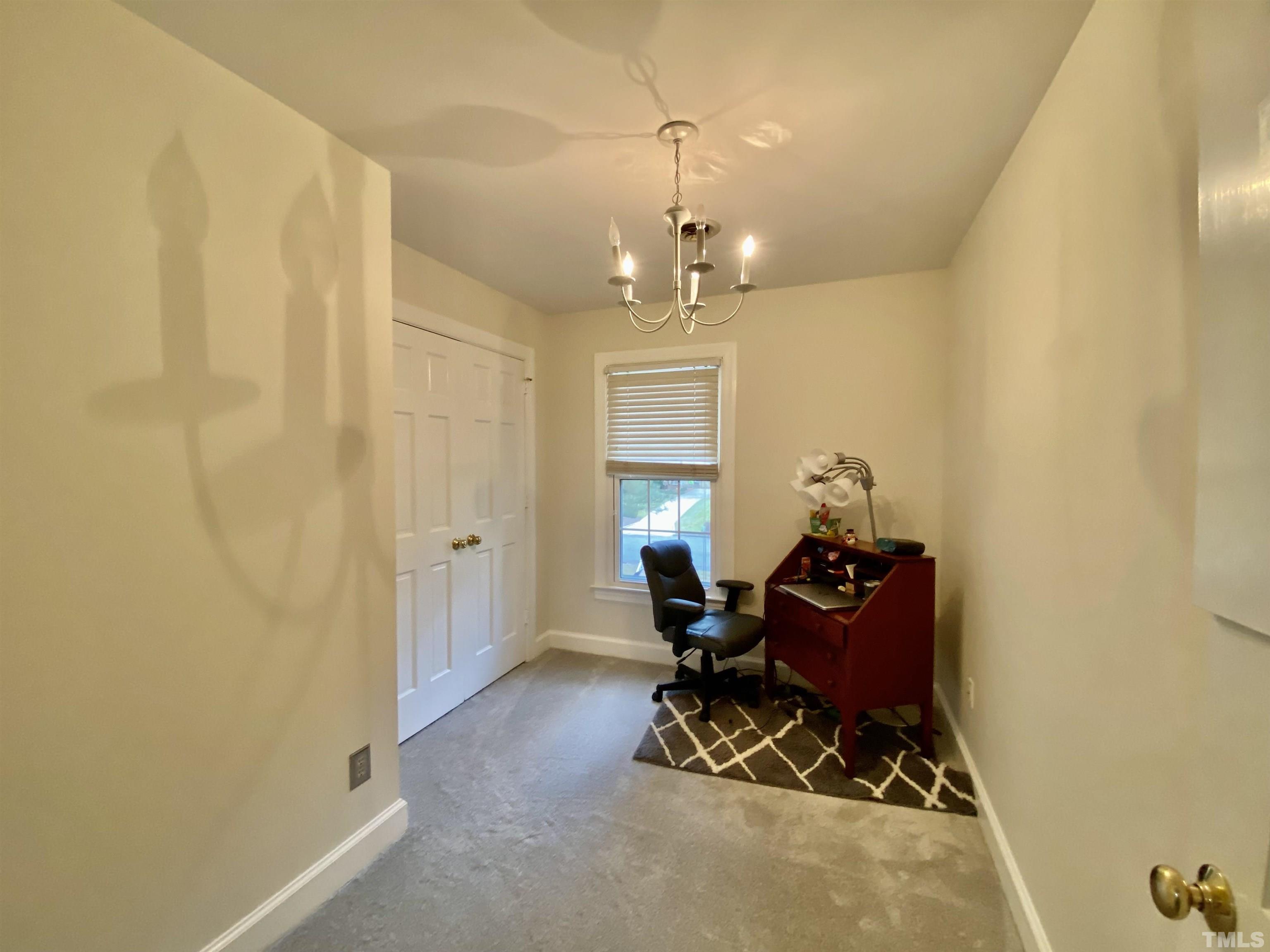 2103 Hermitage Road Northwest Wilson, NC 27896 - Photo 23 of 27 a living room with furniture and a window