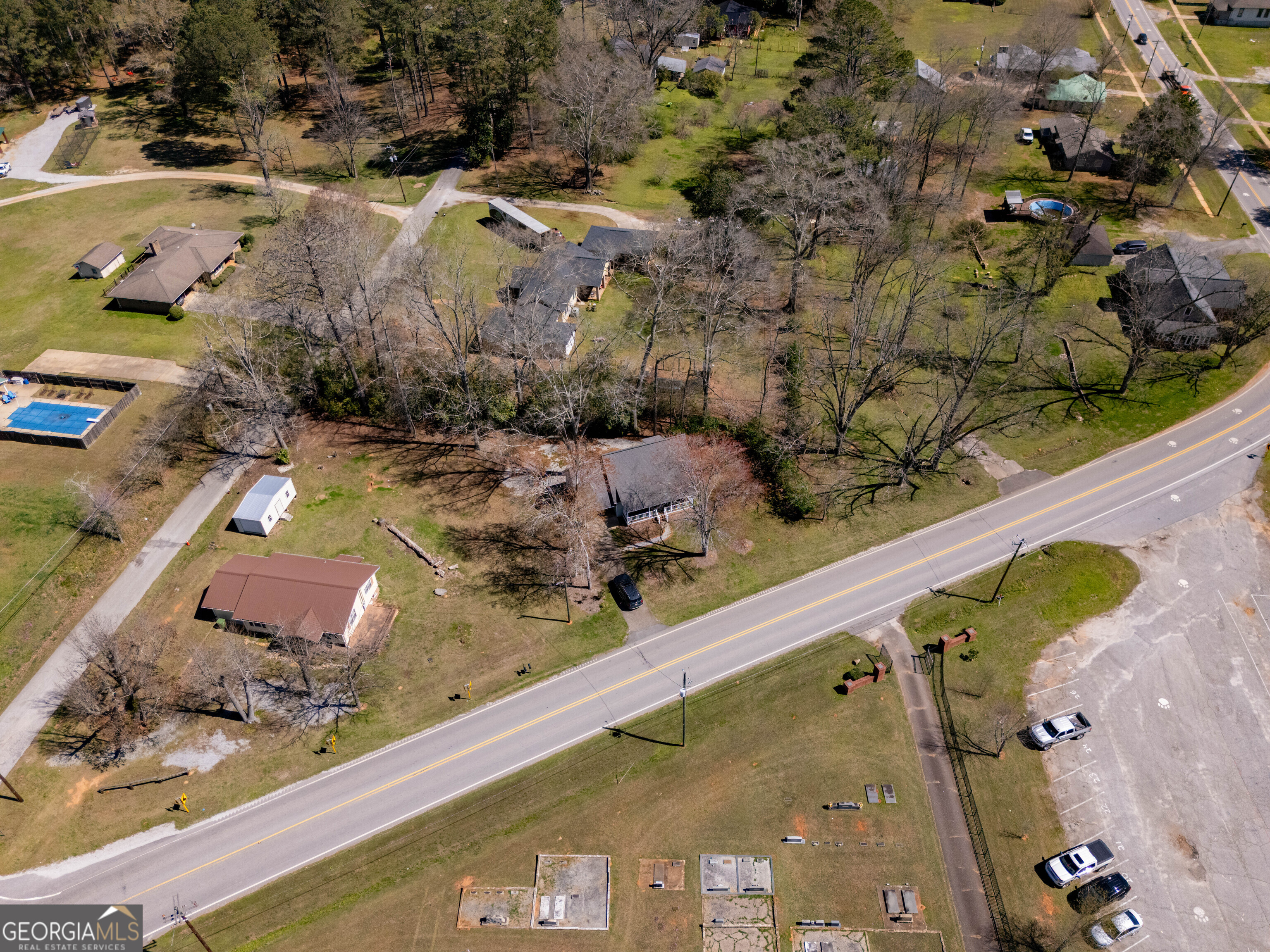 894 Highland Avenue Wadley, AL 36276 - Photo 22 of 26 an aerial view of a house with a yard