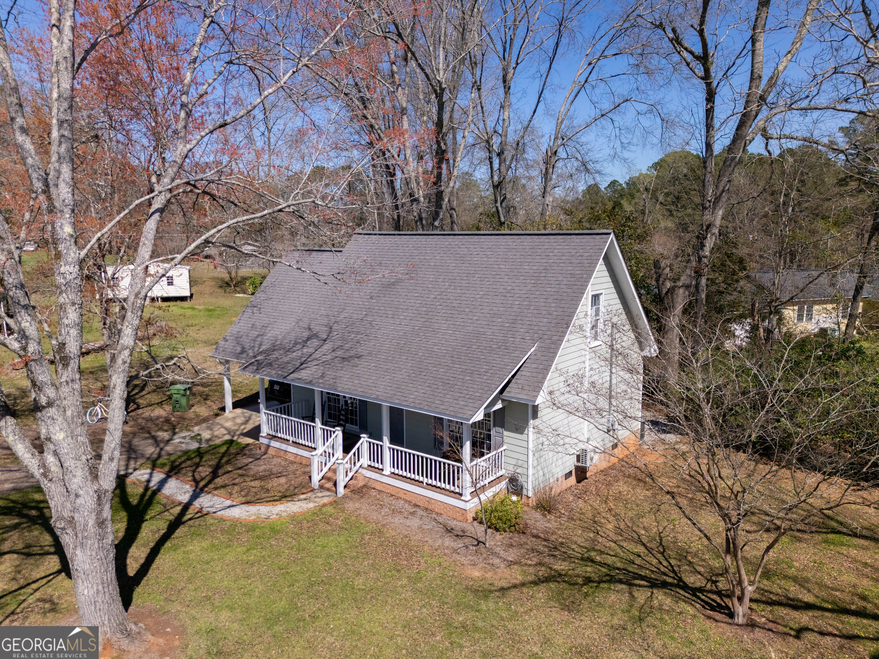 894 Highland Avenue Wadley, AL 36276 - Photo 23 of 26 a view of a house with a yard and covered with snow