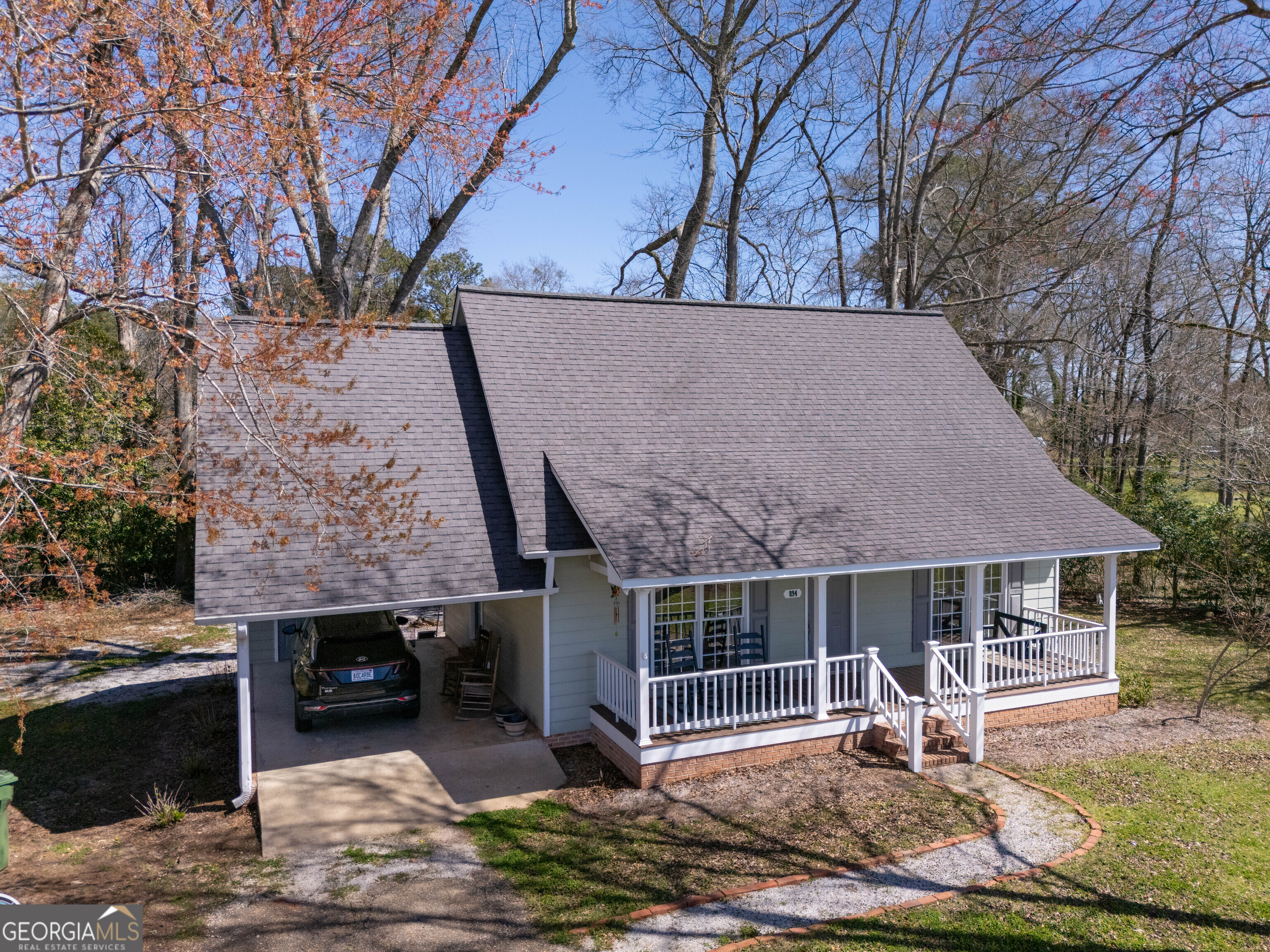 894 Highland Avenue Wadley, AL 36276 - Photo 25 of 26 a view of house with backyard space and seating