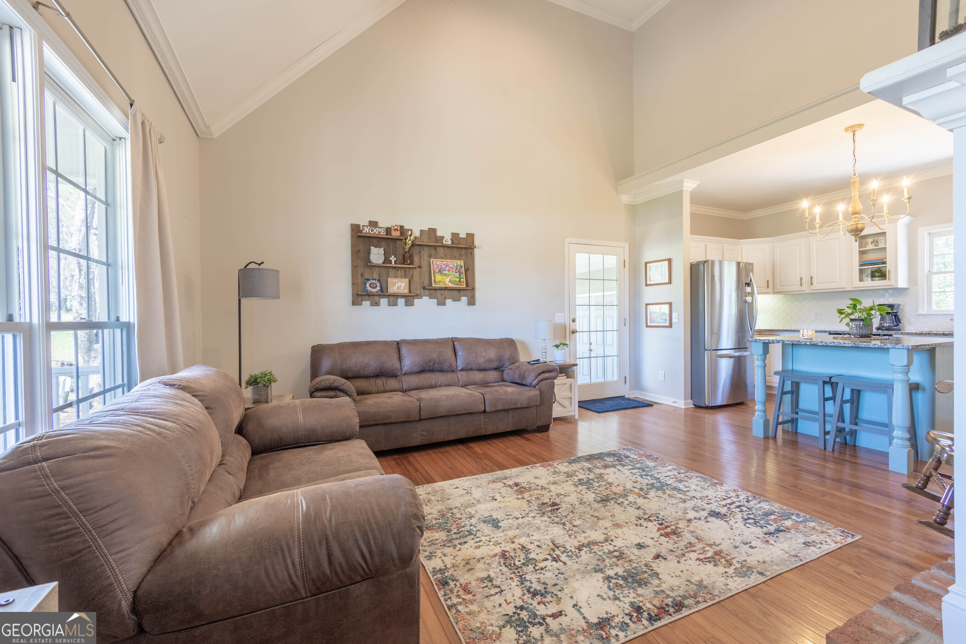 894 Highland Avenue Wadley, AL 36276 - Photo 5 of 26 a living room with furniture and a large window