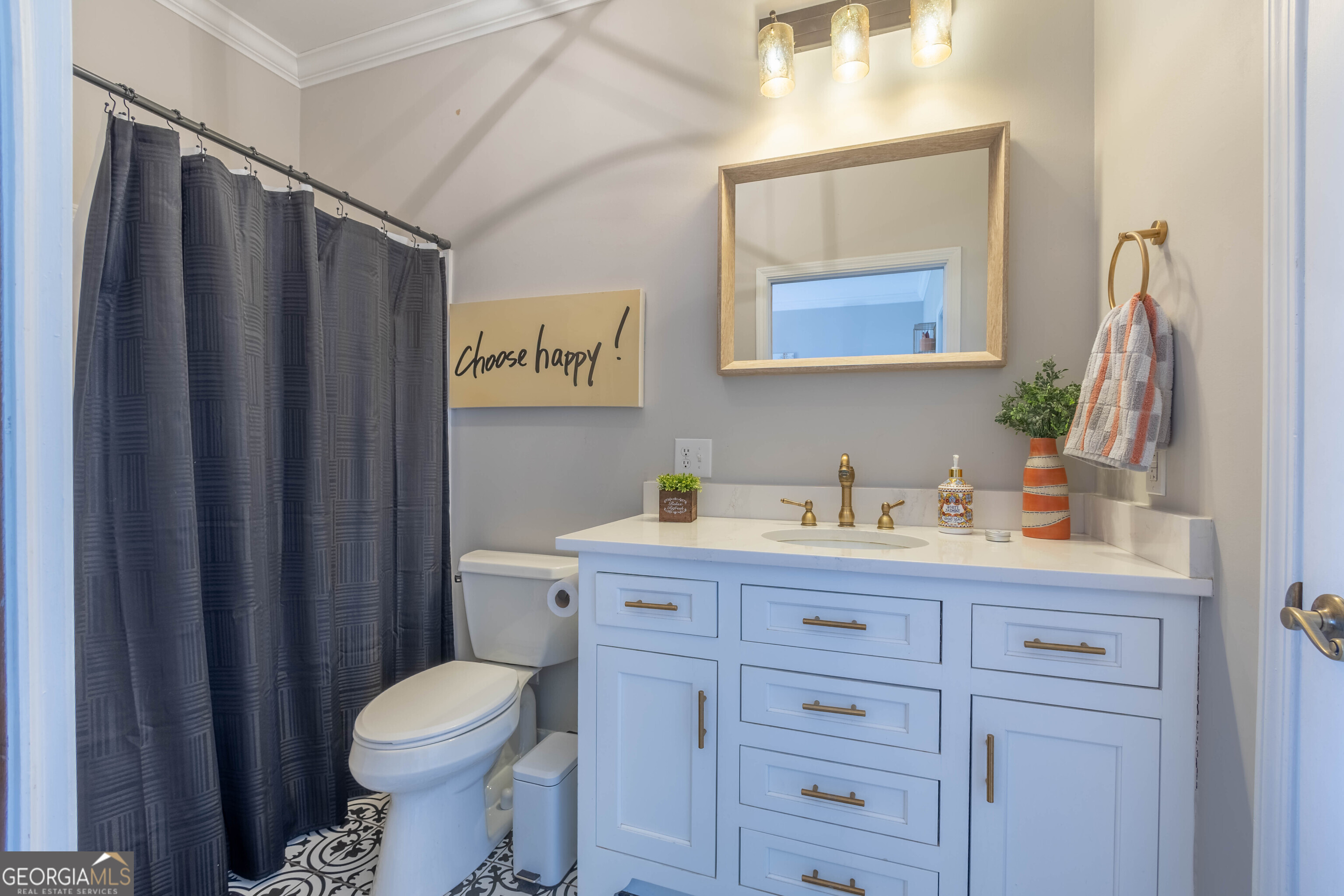 894 Highland Avenue Wadley, AL 36276 - Photo 6 of 26 a view of bathroom with a toilet sink and mirror