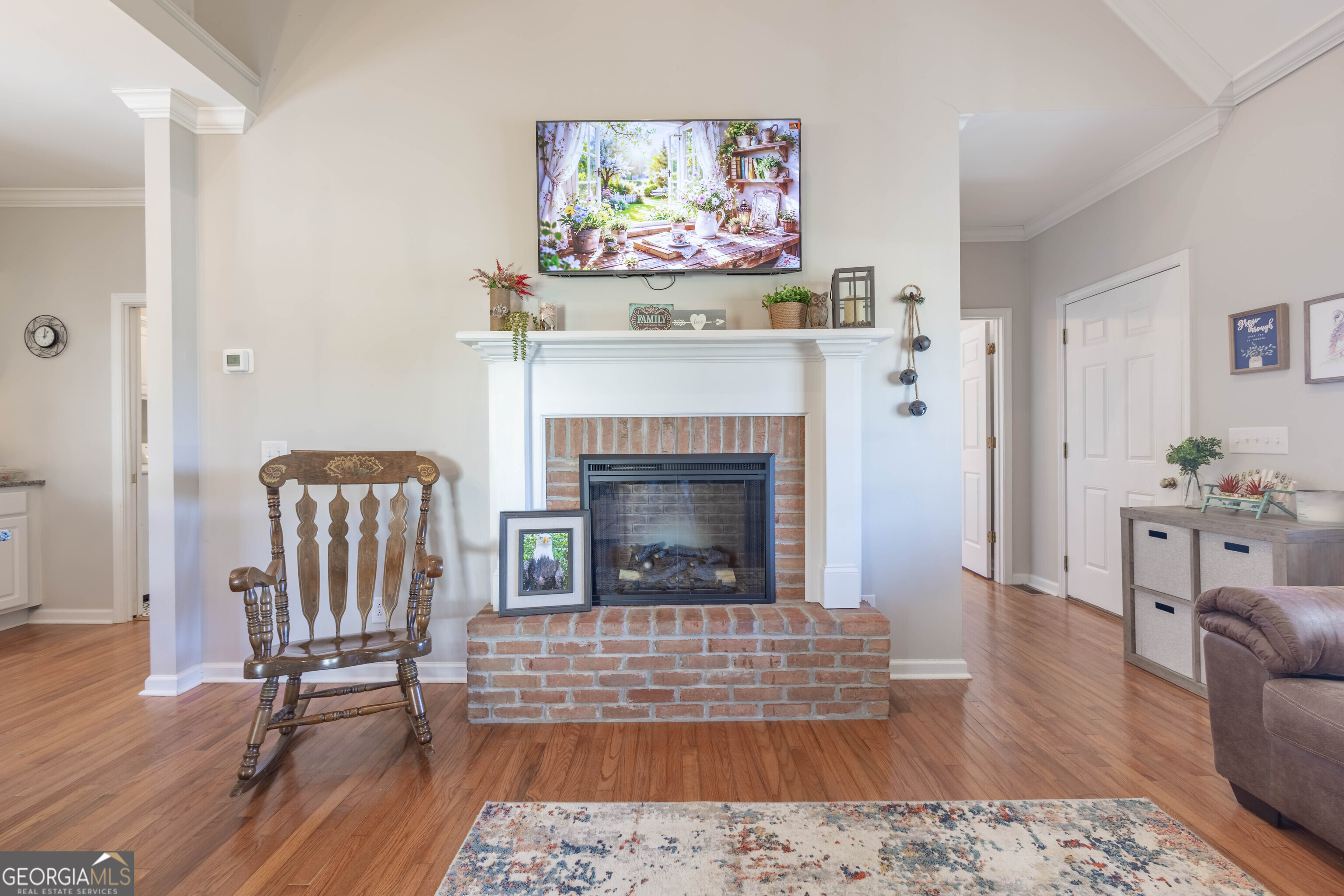 894 Highland Avenue Wadley, AL 36276 - Photo 10 of 26 a living room with furniture and a fireplace