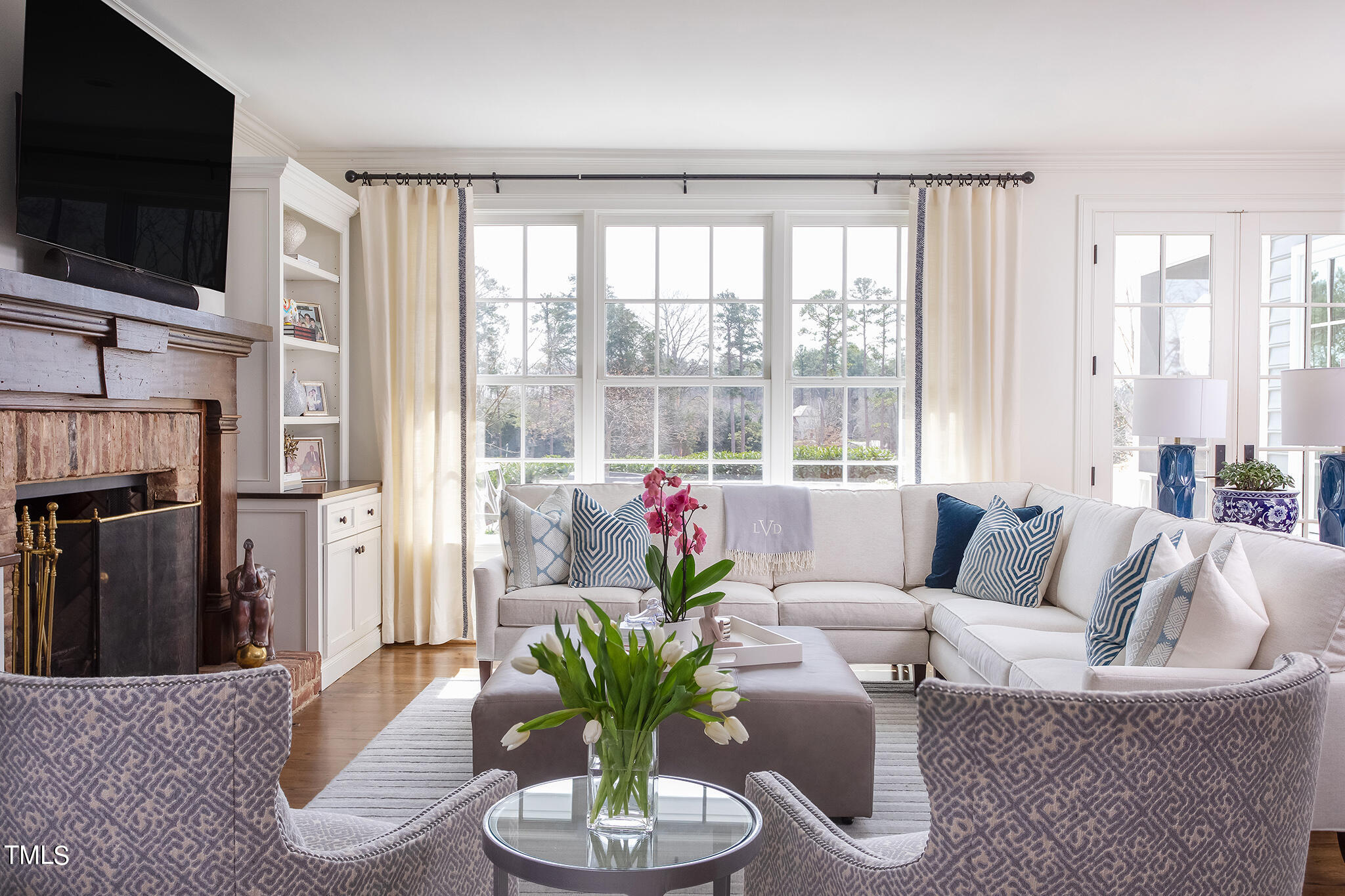 3125 Cornwall Road Durham, NC 27707 - Photo 18 of 99 a living room with furniture large window and flat screen tv