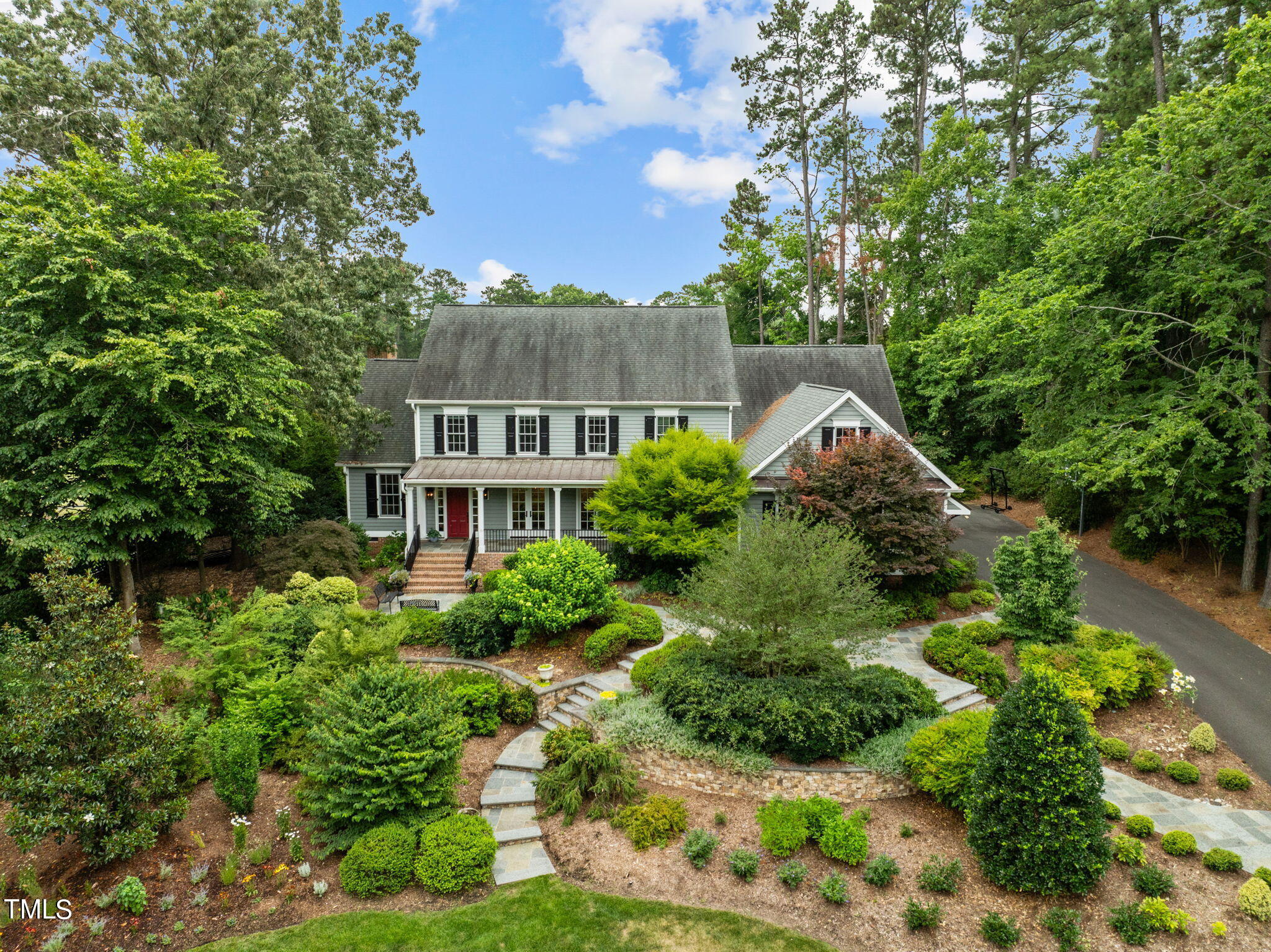 3125 Cornwall Road Durham, NC 27707 - Photo 2 of 99 an aerial view of a house with a yard and large trees