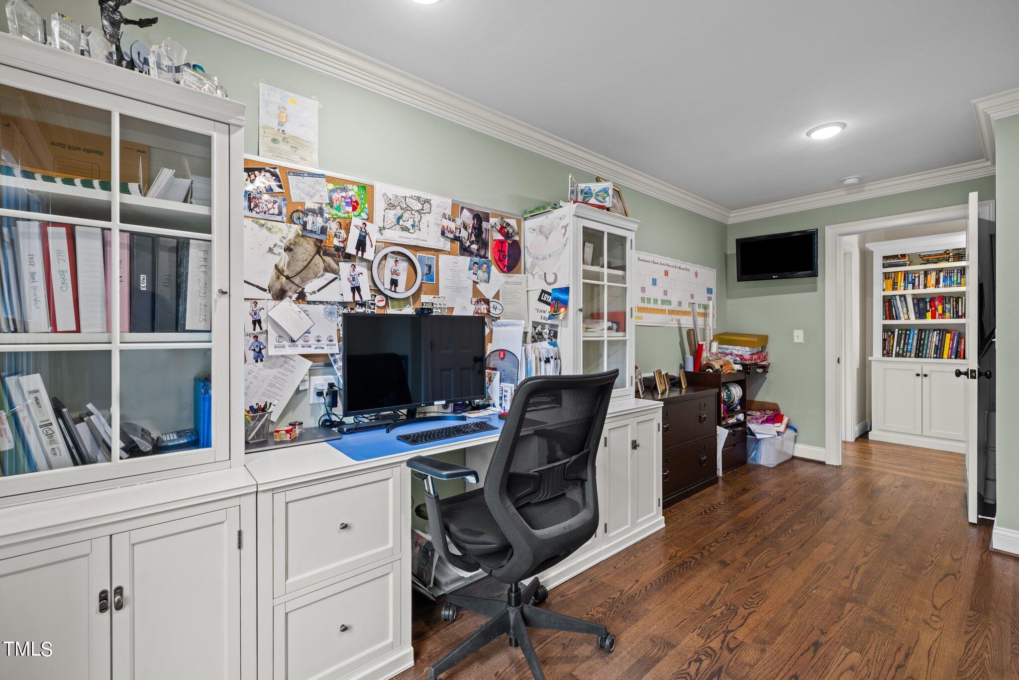 3125 Cornwall Road Durham, NC 27707 - Photo 63 of 99 a view of a workspace with furniture and a window