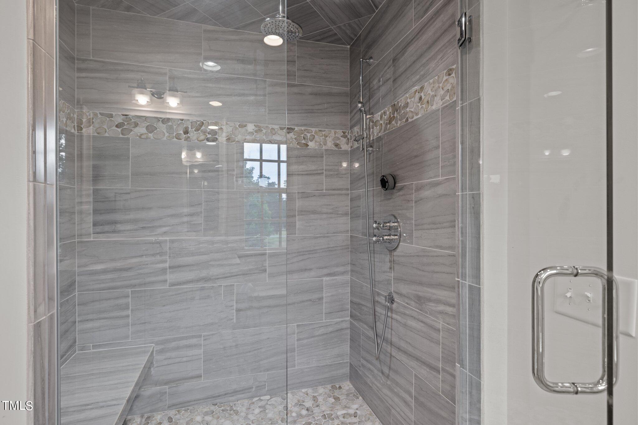 3125 Cornwall Road Durham, NC 27707 - Photo 68 of 99 a bathroom with a shower