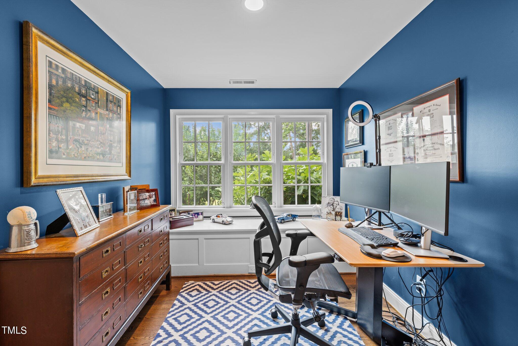 3125 Cornwall Road Durham, NC 27707 - Photo 76 of 99 a view of a workspace with furniture and a window