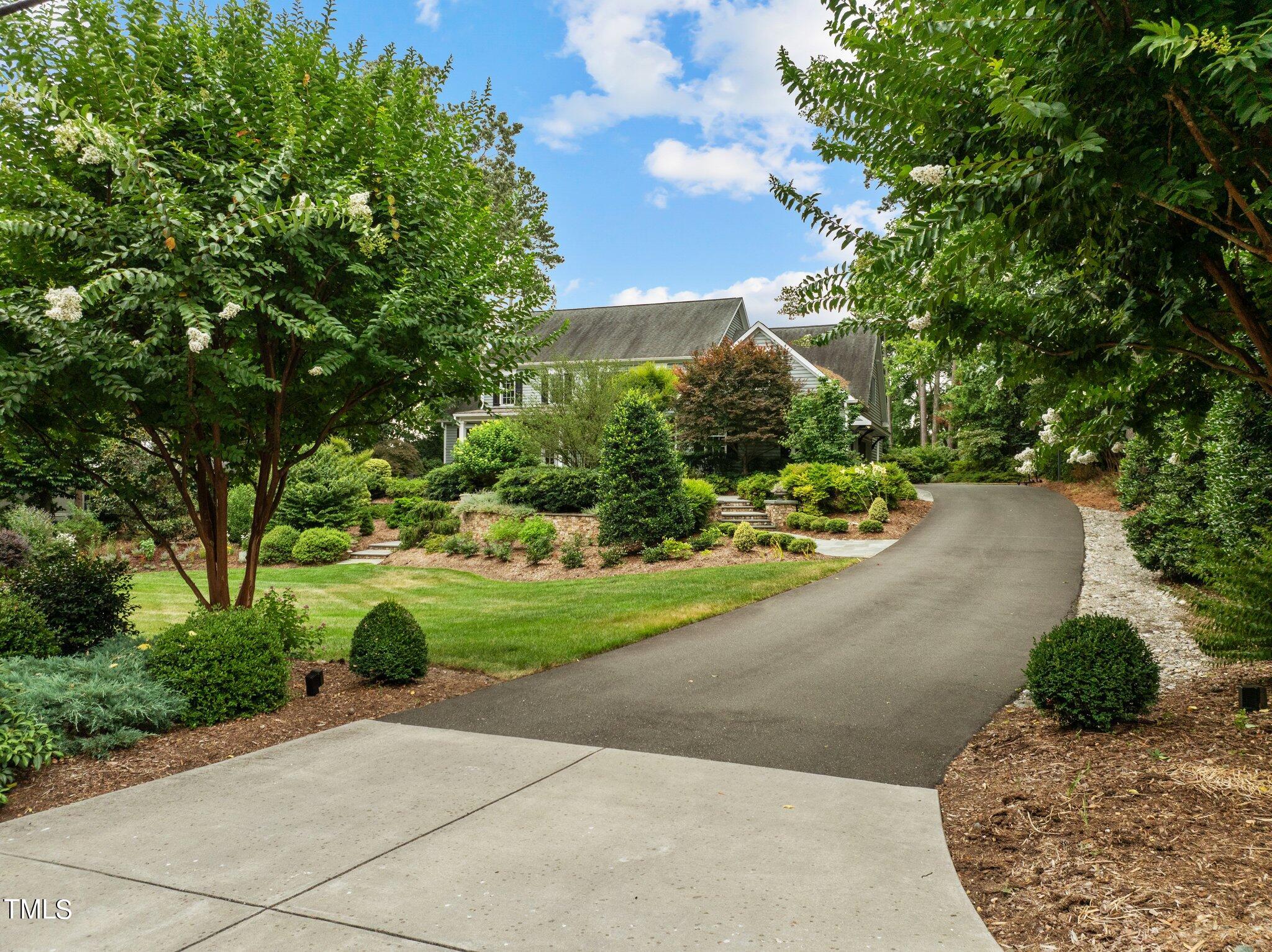3125 Cornwall Road Durham, NC 27707 - Photo 83 of 99 a view of a garden with potted plants