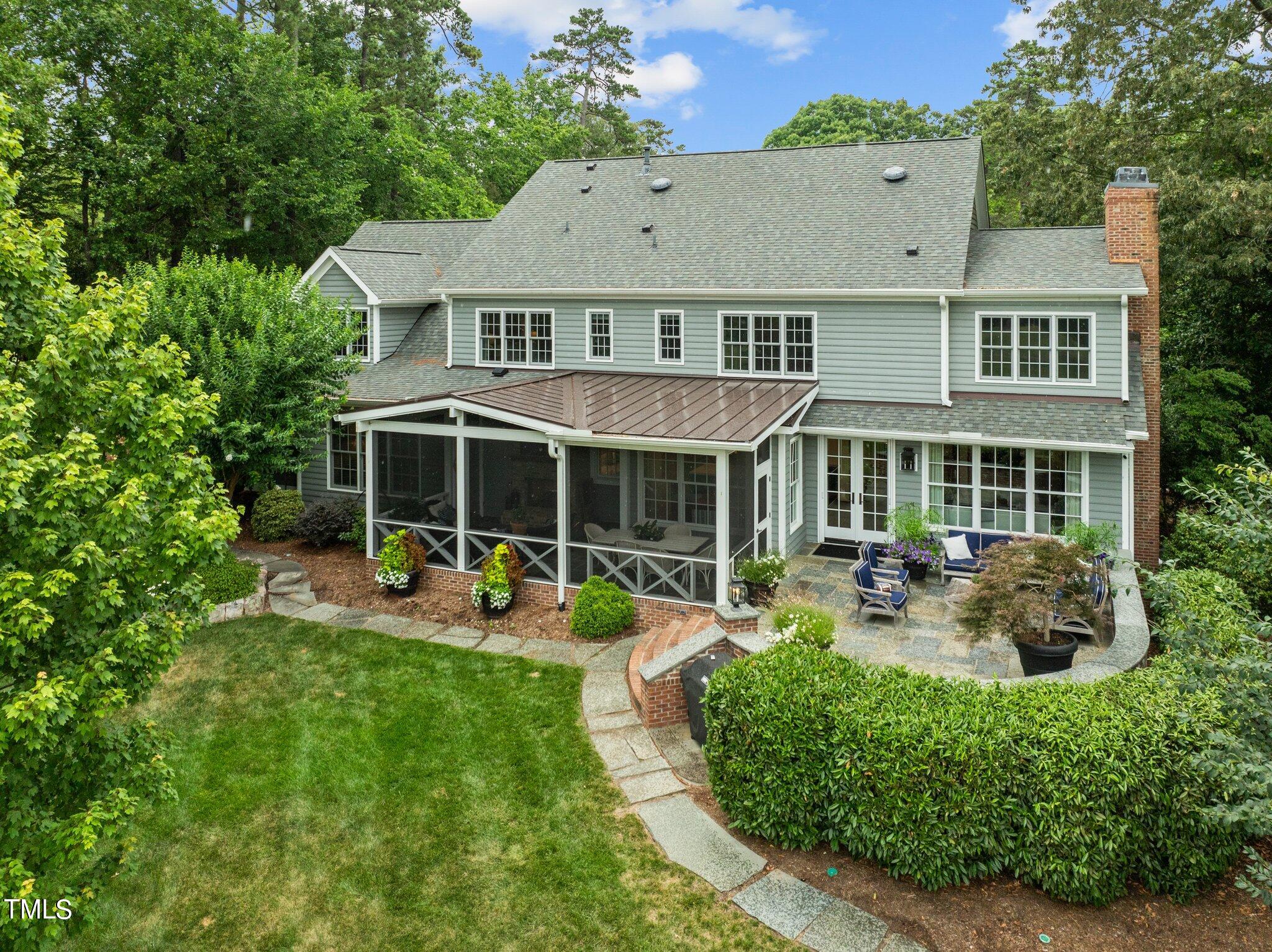 3125 Cornwall Road Durham, NC 27707 - Photo 87 of 99 a view of a house with a yard and sitting area
