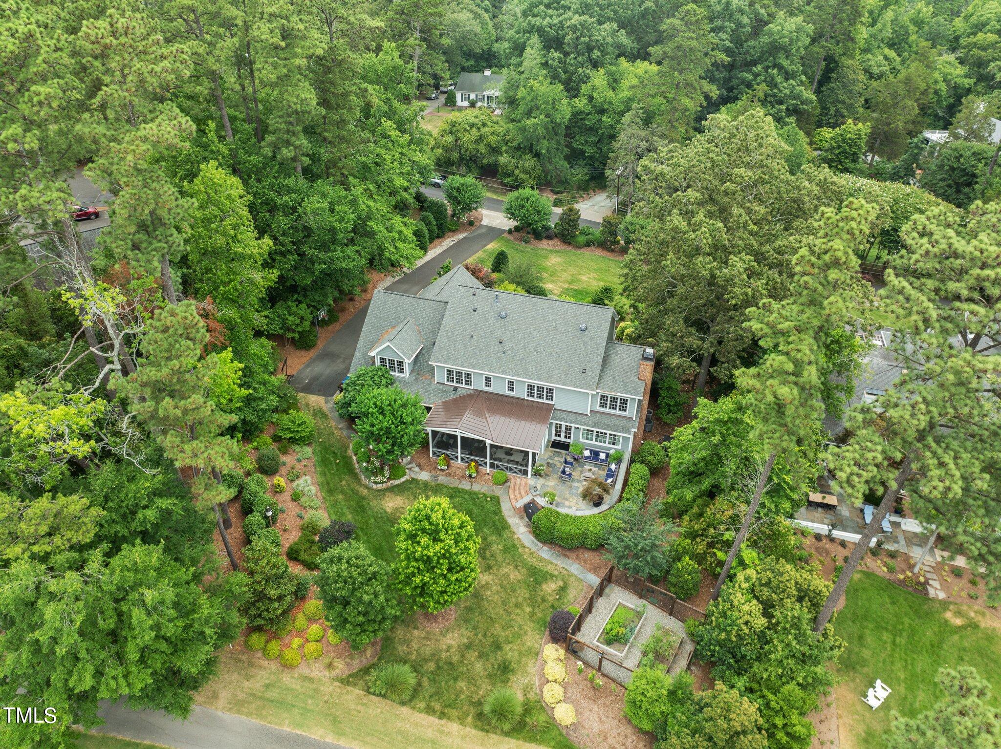 3125 Cornwall Road Durham, NC 27707 - Photo 96 of 99 an aerial view of a house with a yard