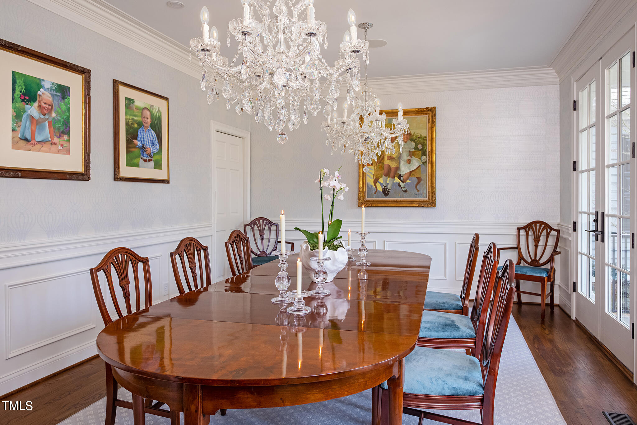 3125 Cornwall Road Durham, NC 27707 - Photo 10 of 99 a view of a dining room with furniture a chandelier and wooden floor