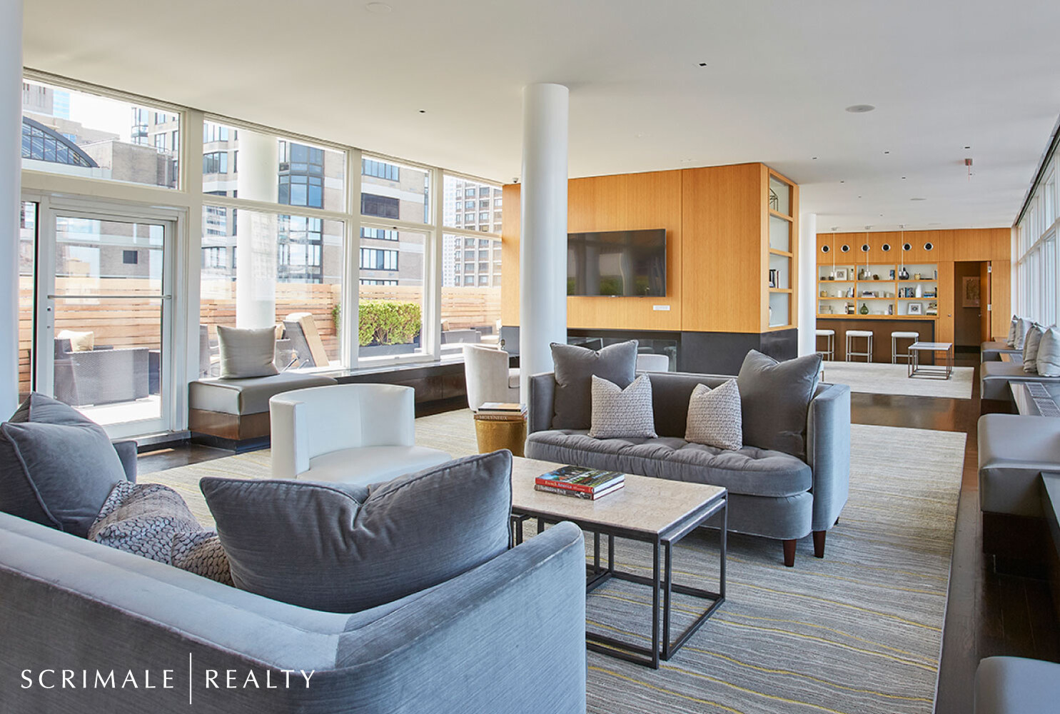 200 East 66th Street, Unit C402 Manhattan, NY 10065 - Photo 12 of 15 a living room with furniture and a floor to ceiling window