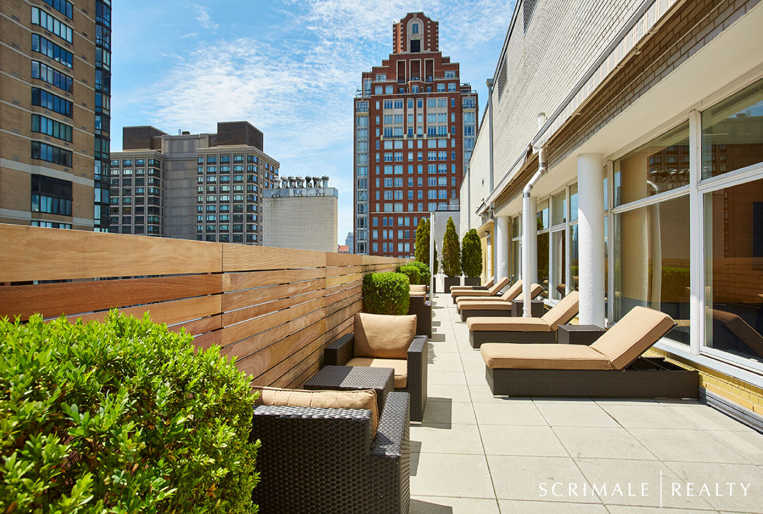 200 East 66th Street, Unit C402 Manhattan, NY 10065 - Photo 13 of 15 a view of balcony with couch