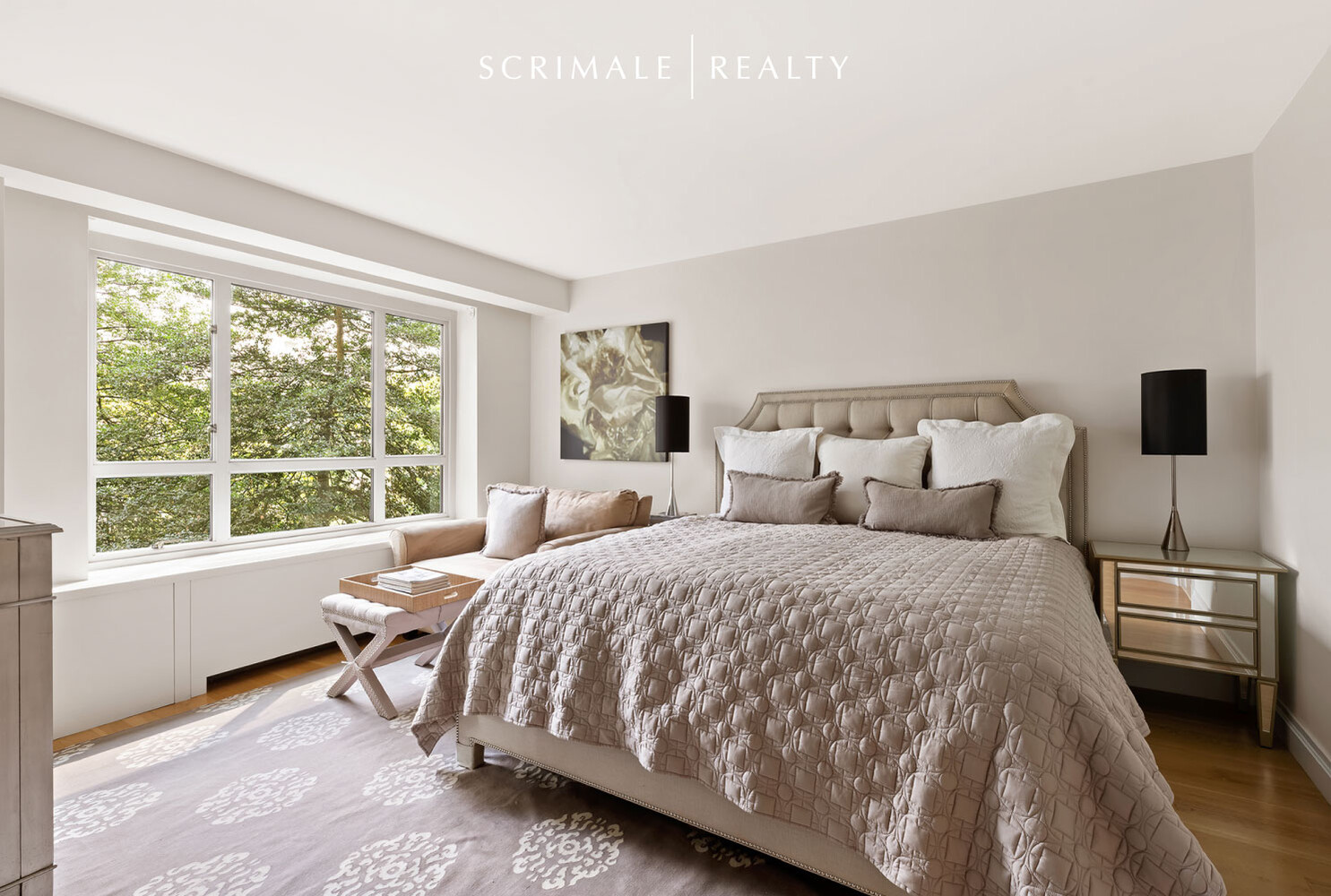 200 East 66th Street, Unit C402 Manhattan, NY 10065 - Photo 3 of 15 a bedroom with a bed and glass window