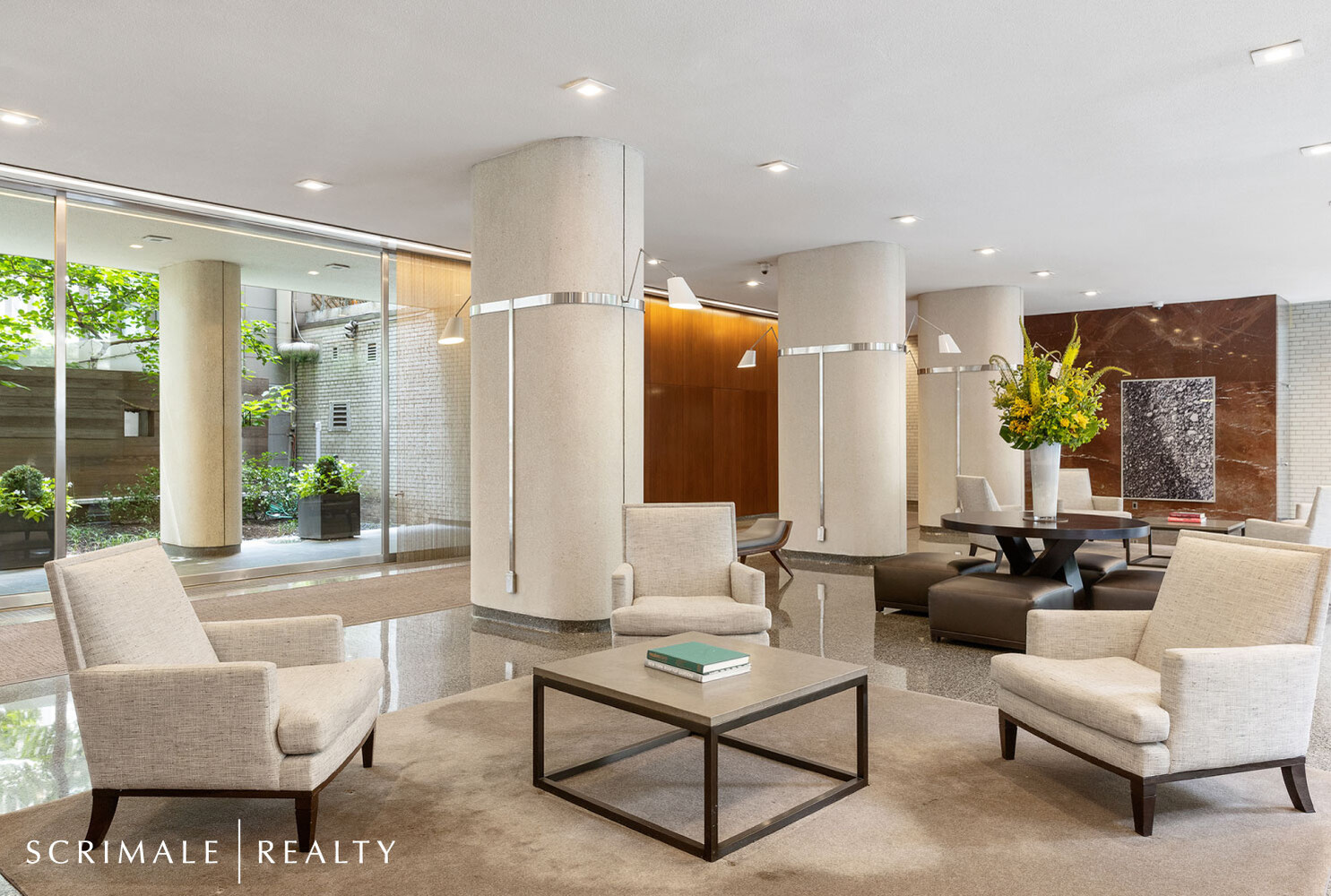 200 East 66th Street, Unit C402 Manhattan, NY 10065 - Photo 7 of 15 a living room with furniture and a large window