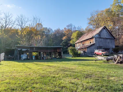 a view of a golf course with a lake view