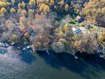 a view of bed and wooden floor