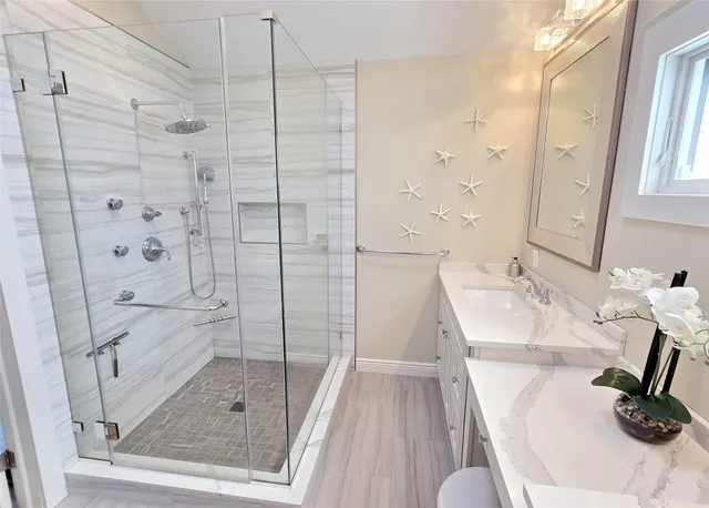 a bathroom with a sink and a mirror