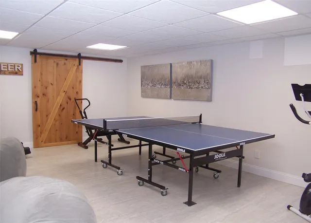 a view of a workspace with furniture