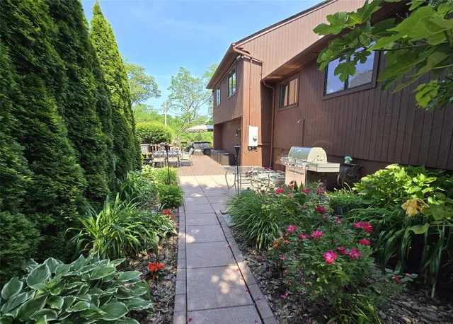 a garden view with a seating space