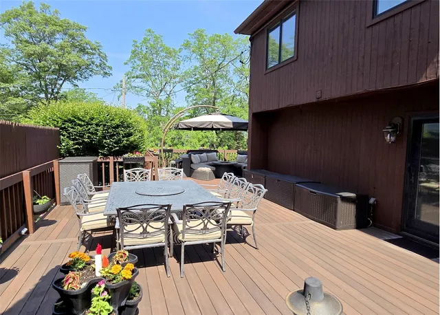 a outdoor space with furniture and umbrella