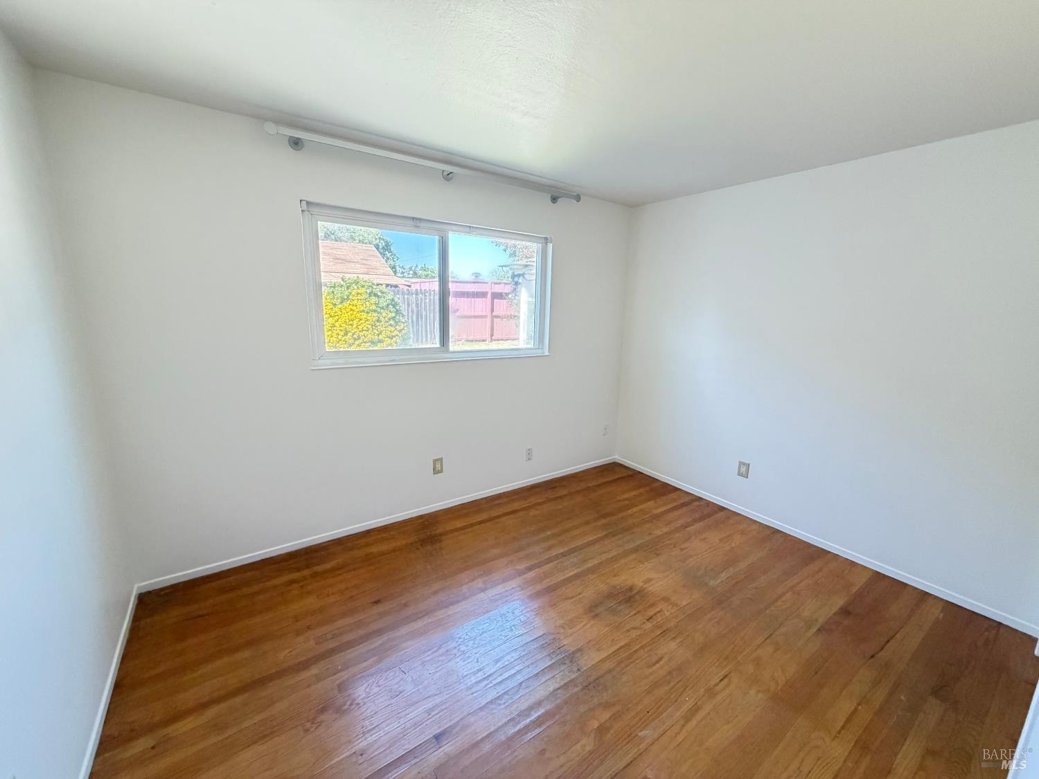 991 Rolling Green Drive Rio Vista, CA 94571 - Photo 17 of 30 a view of empty room with wooden floor