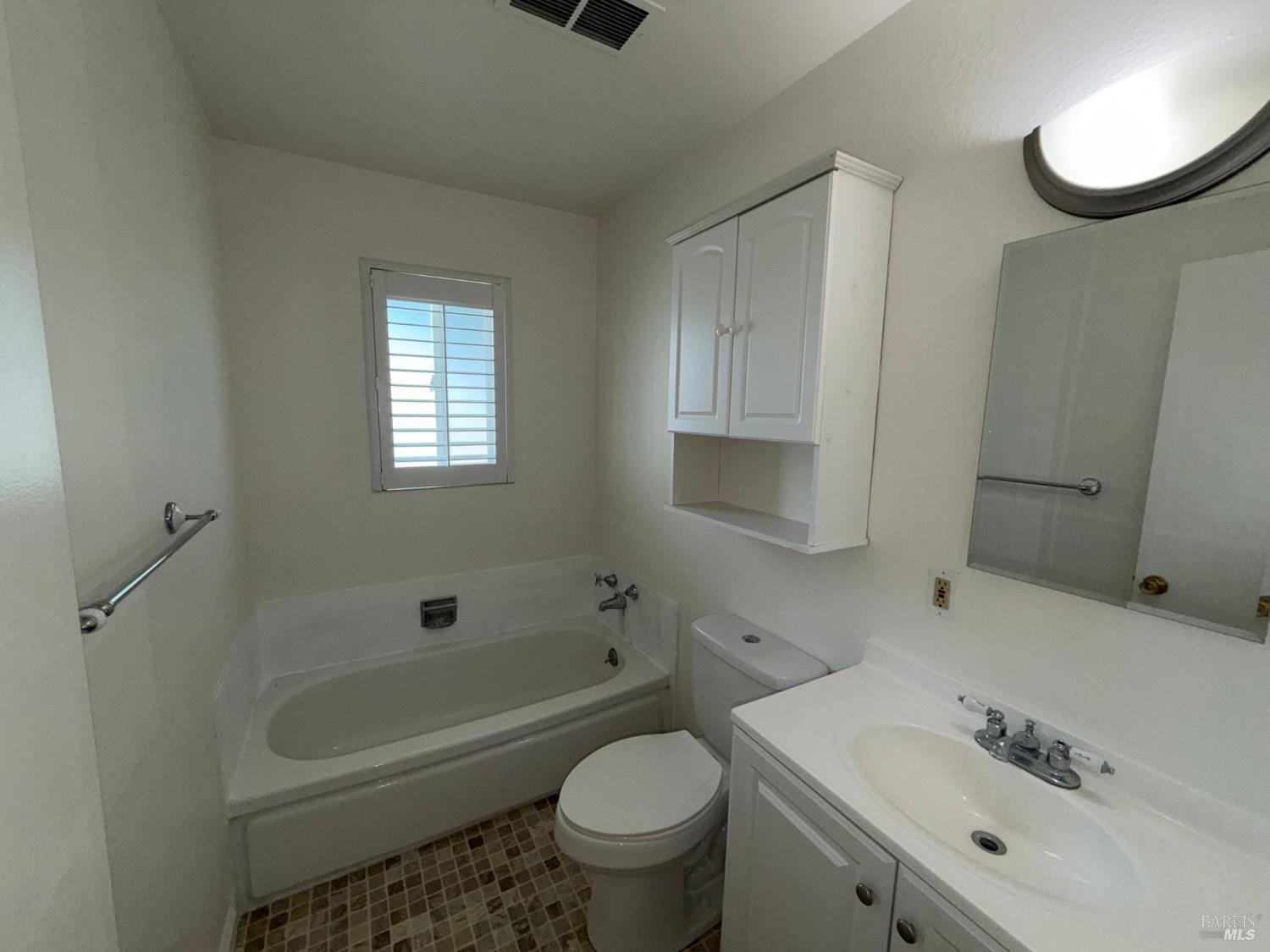 991 Rolling Green Drive Rio Vista, CA 94571 - Photo 24 of 30 a bathroom with a sink a toilet and a bathtub