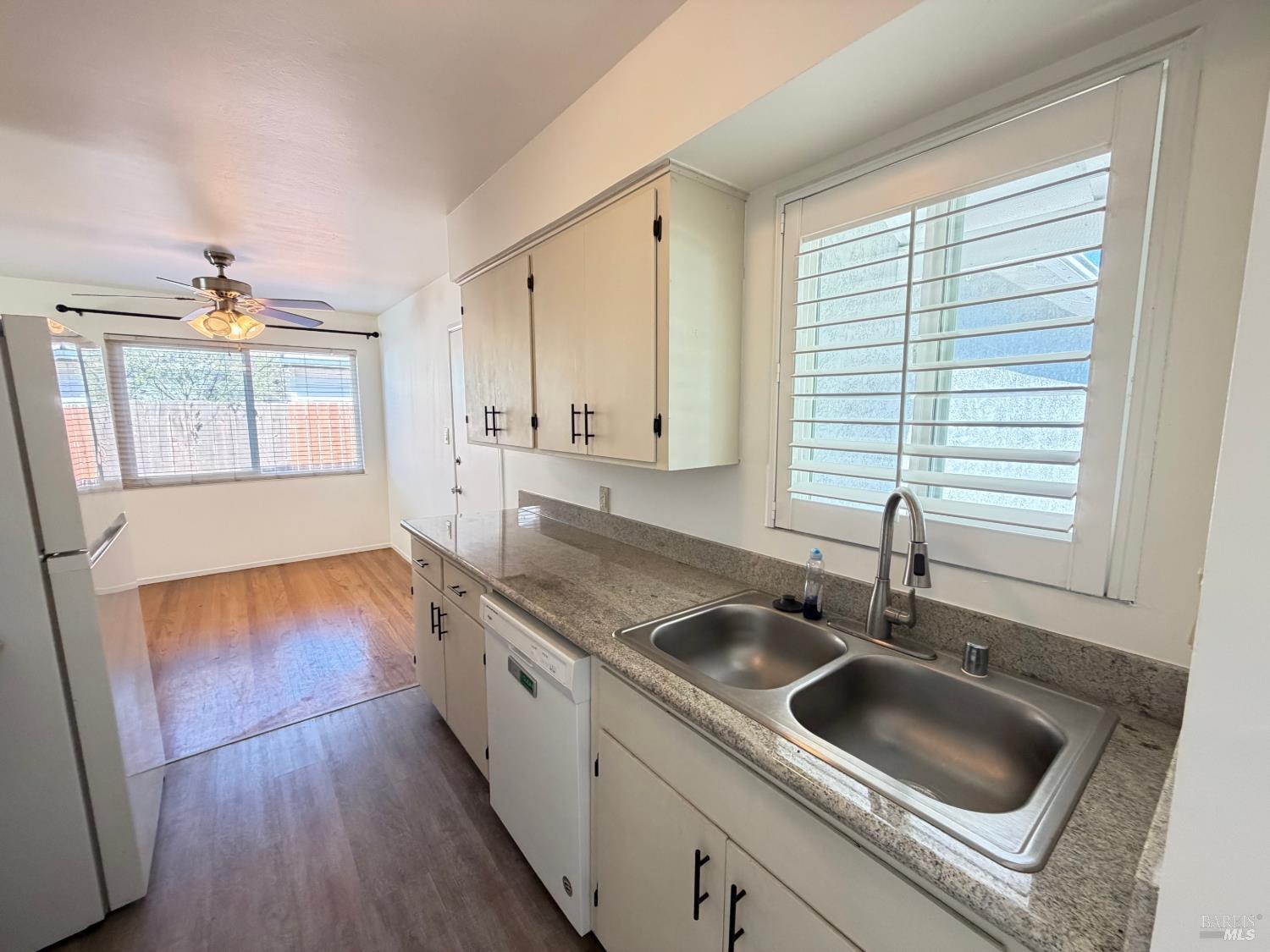 991 Rolling Green Drive Rio Vista, CA 94571 - Photo 9 of 30 a kitchen with a sink and cabinets
