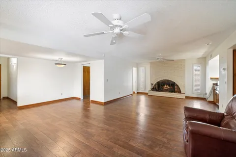 a view of livingroom with furniture and wooden floor