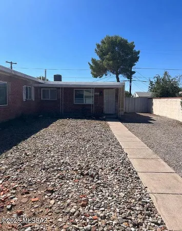 a front view of a house having yard