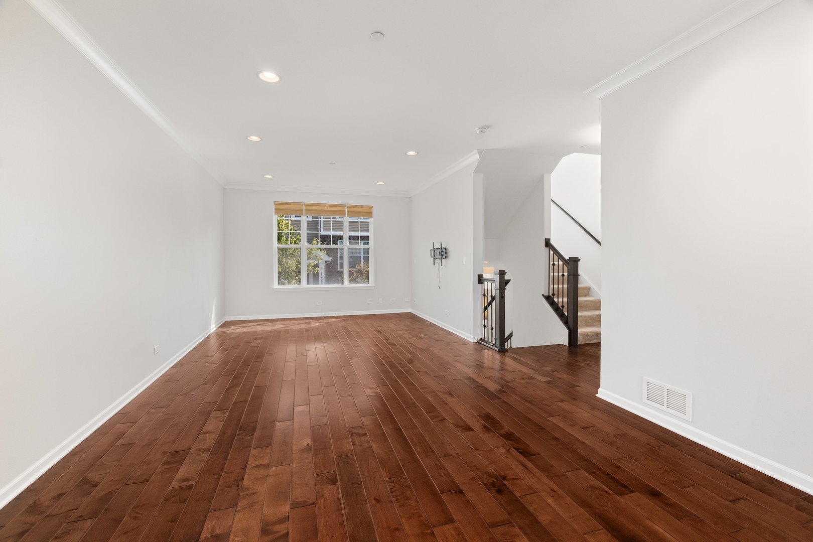 1228 Elm Street Park Ridge, IL 60068 - Photo 11 of 36 an empty room with wooden floor and windows