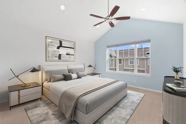 a bedroom with bed and window