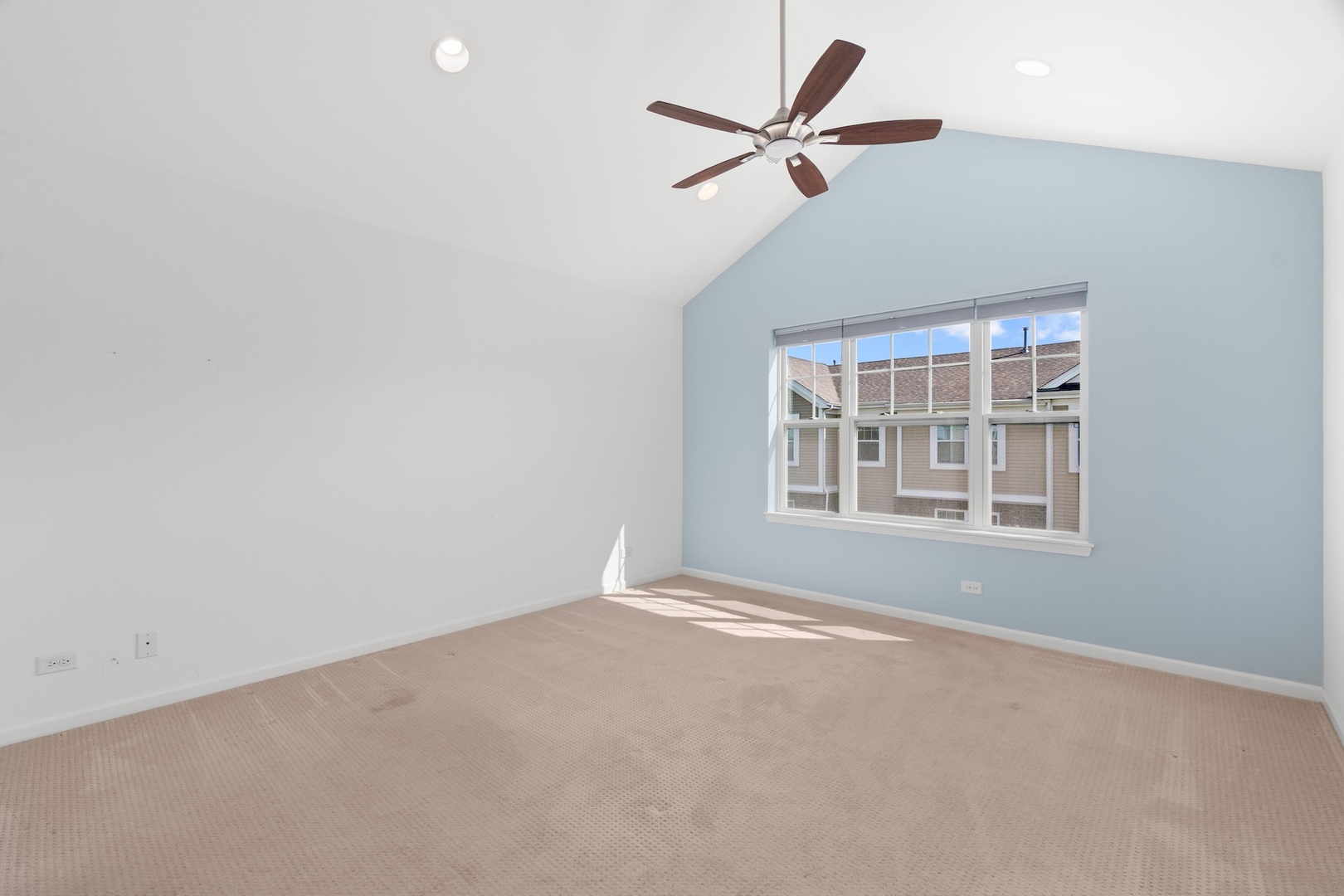 1228 Elm Street Park Ridge, IL 60068 - Photo 14 of 36 en empty room with windows and ceiling fan